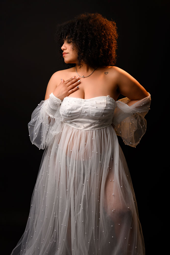 Glamorous portrait of a woman in a tulle dress